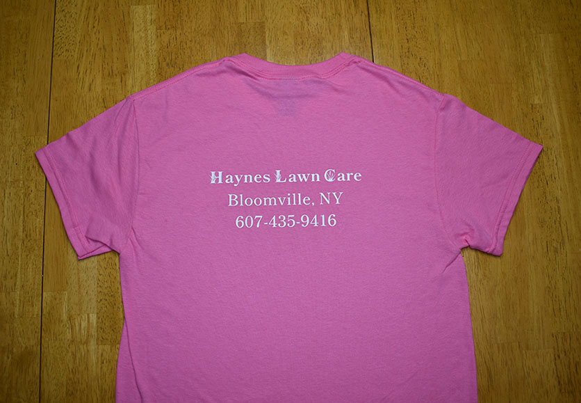 haynes lawn care pink shirt back